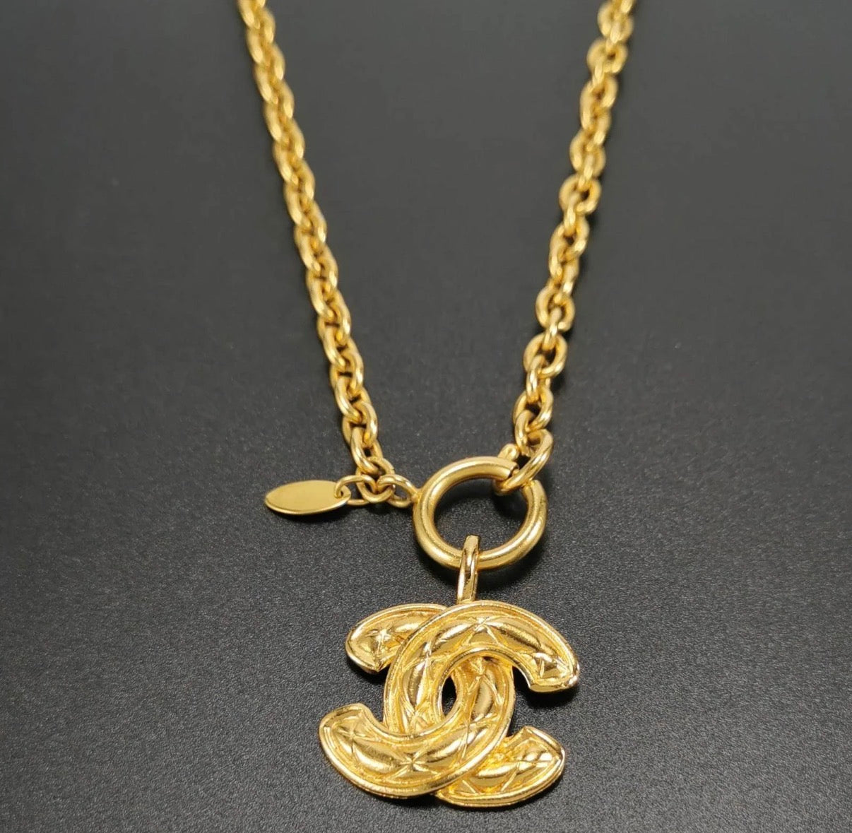 Chanel Coco Mark Necklace Gold 1980-1990s diamond-quilted CC pendant necklace