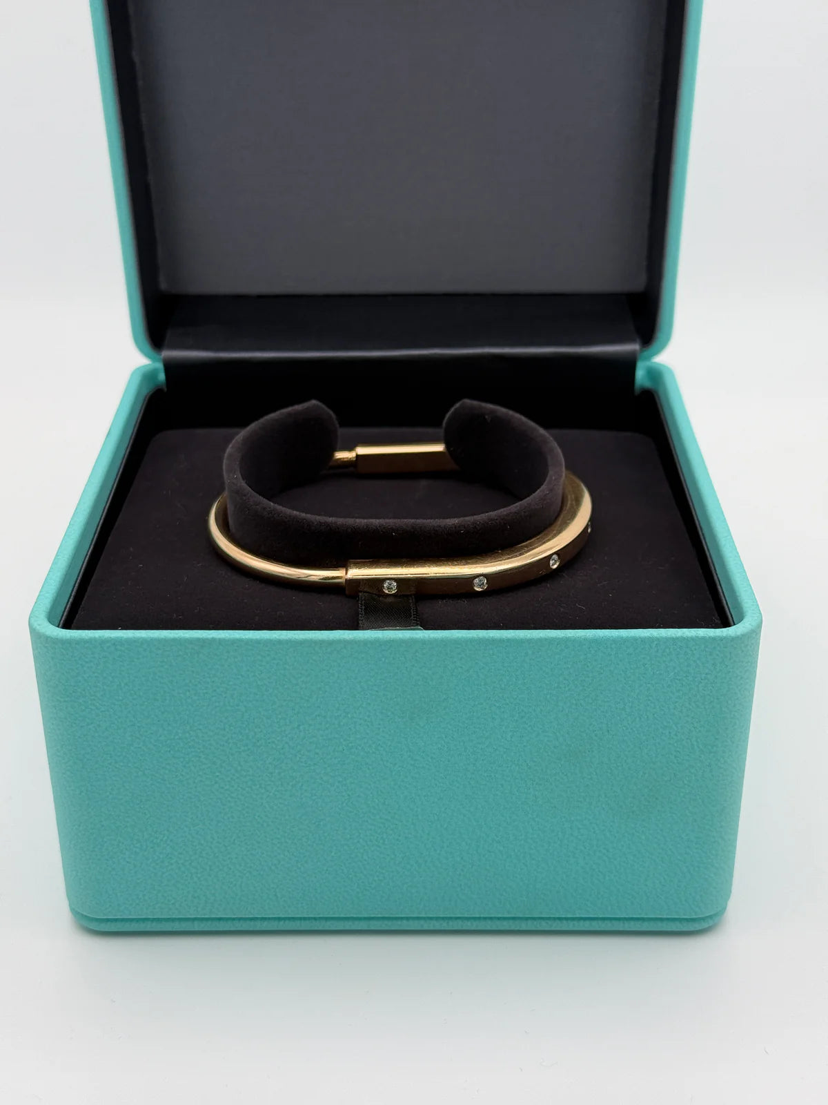 TIFFANY & CO DIAMOND LOCK BANGLE YELLOW GOLD WITH DIAMOND ACCENTS