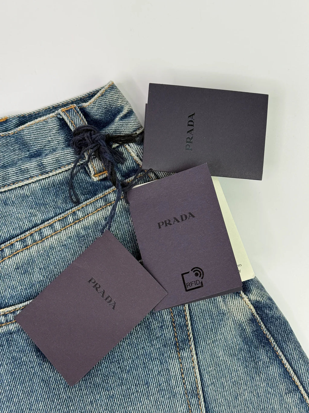 PRADA LOGO DENIM SHORTS (SIZE 28 /UK 12)