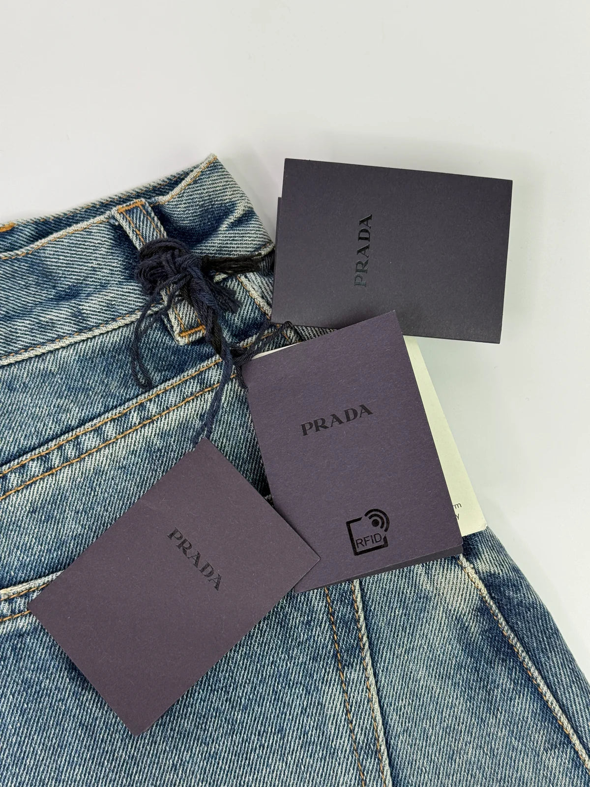 PRADA LOGO DENIM SHORTS (SIZE 28 /UK 12)